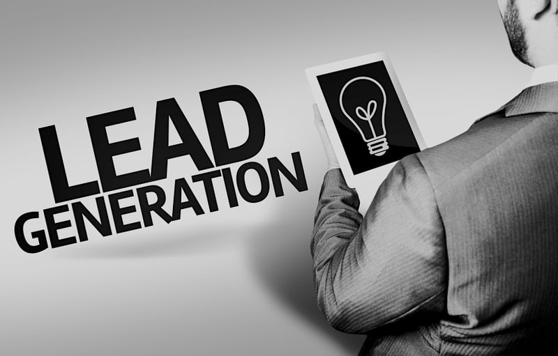 man holding tablet with light bulb on screen and lead generation text