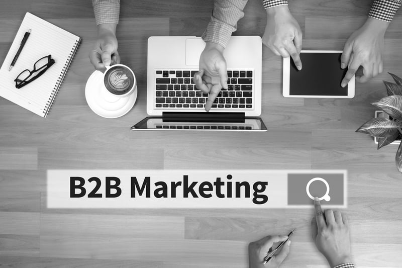 team discussion about b2b digital marketing
